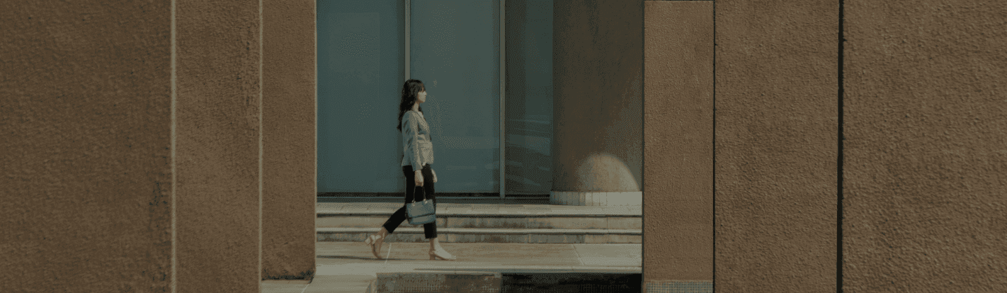 Modern office building exterior, glass and steel architecture, business district.